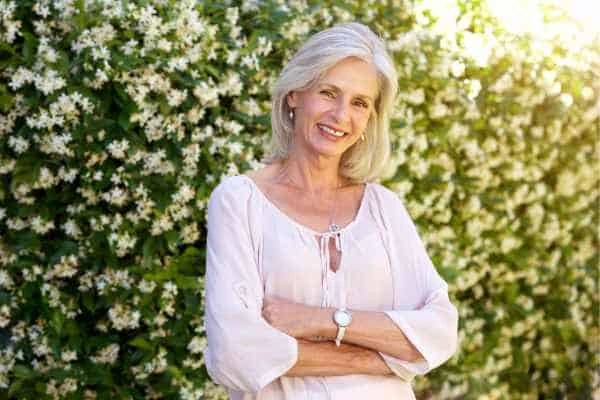 Older woman happy with urinary incontinence treatment Bushey